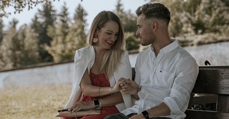 Well-dressed couple at the park