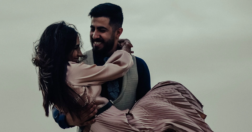 A couple on a date on a windy day