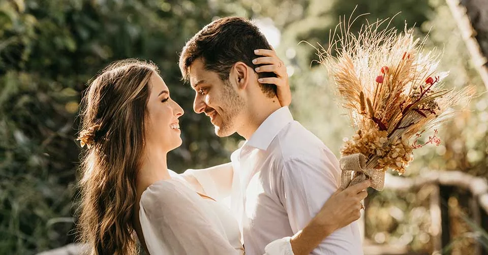 A newly married couple on a bridge