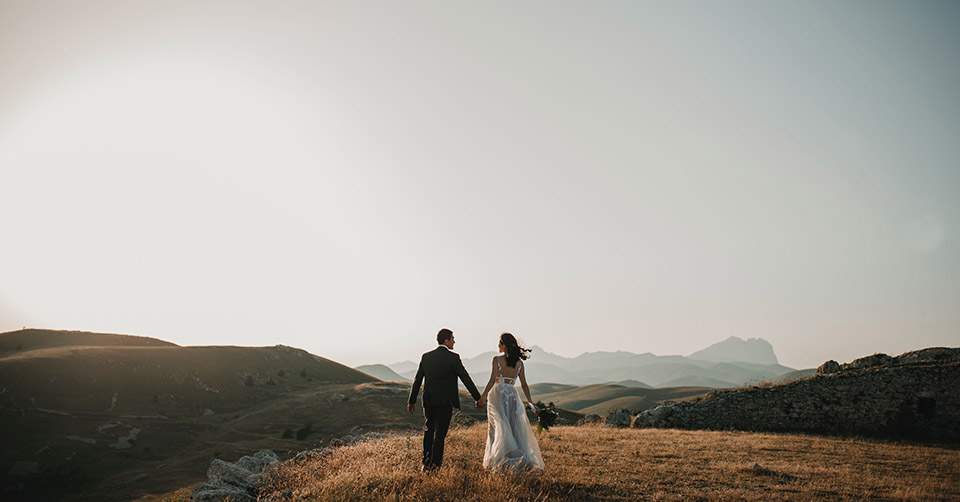 Married couple posing in the plains