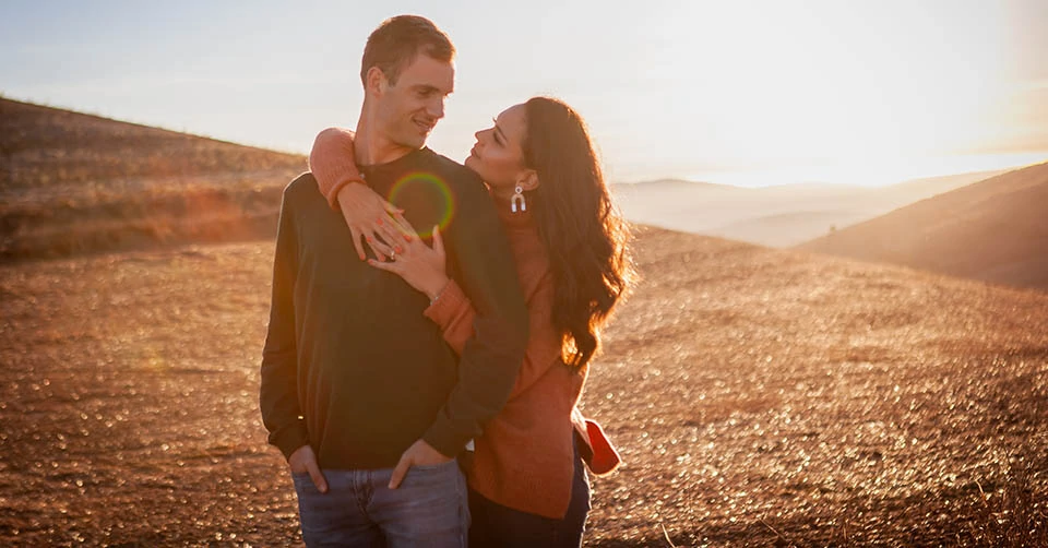 A couple on a hill