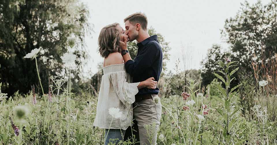 A couple on a date in a field