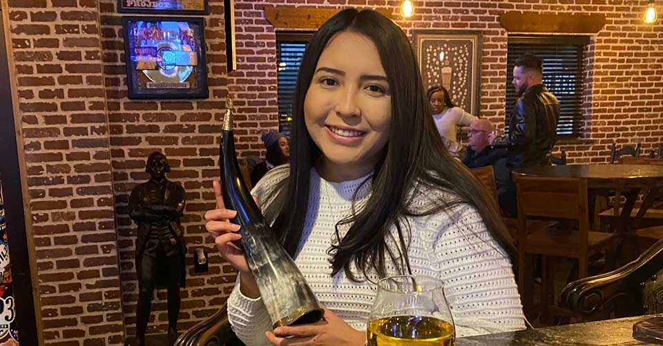 Holding a beer horn at Kool Keg Beer and Margaritas Arlington Texas