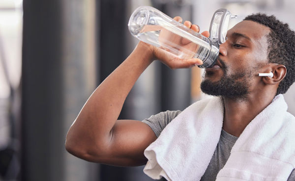 A man fighting off the signs of dehydration