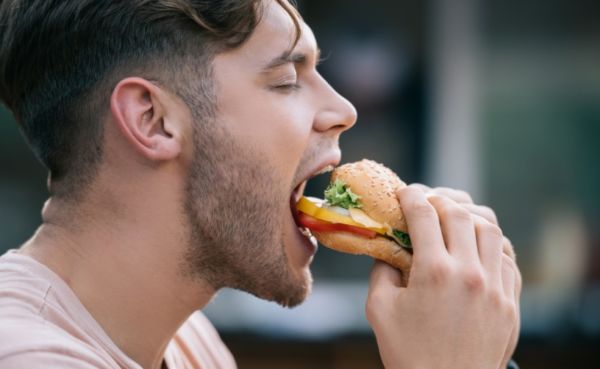 Eating fast food even if it's bad for him