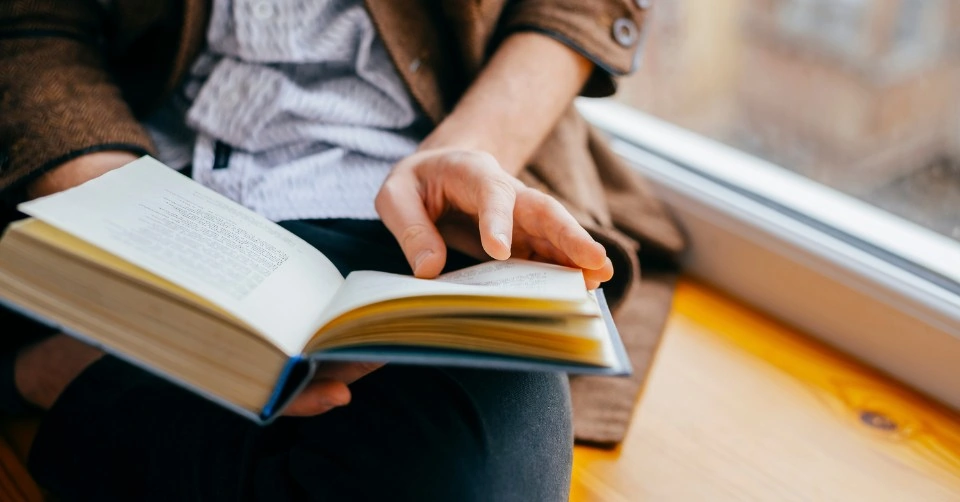 Reading feminist literature to open his mind