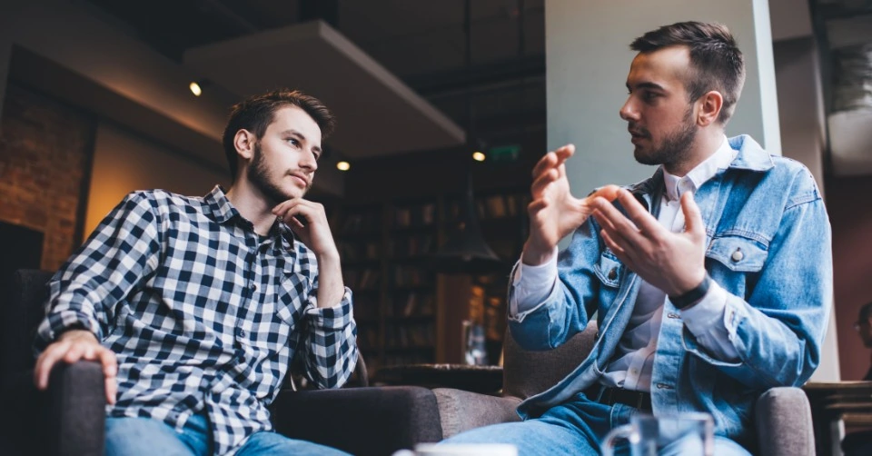 Talking to his friend about mental health