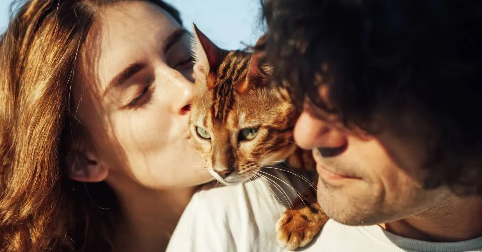 A couple with their cat