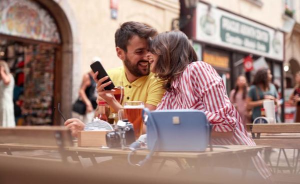 Romantic date in a cafe after meeting on a European dating site